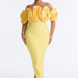 Rosetta Bandage Gown Available In Black, Black/White, Butter Yellow And Red. Self: 95% Polyester 5% Spandex, Contrast: 95% Polyester 5% Spandex